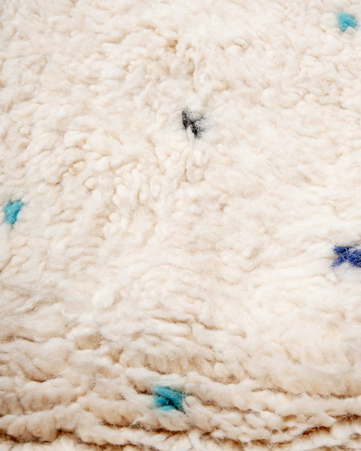 Modern, designer, handcrafted Berber rug from Morocco. Beniourain carpet with beautiful colours and patterns and fluffy wool texture.